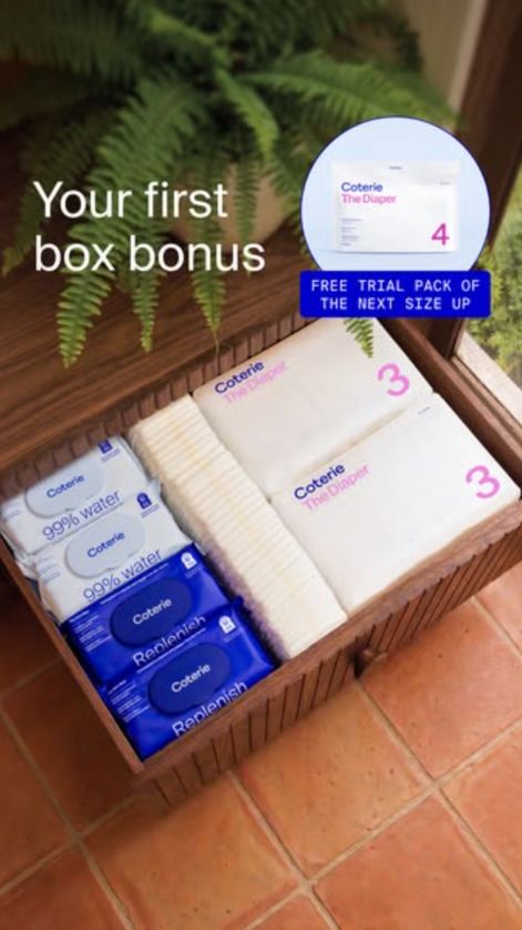 Open wooden drawer full of Coterie diaper packs and wipes, with “Your first box bonus” and an inset size-4 pack tagged “Free trial pack of the next size up”