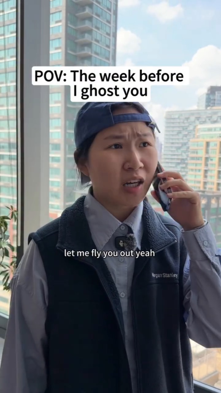 A creator in a backwards cap and fleece vest talks on the phone by a high-rise window, under “POV: The week before I ghost you” with the subtitle “let me fly you out yeah”